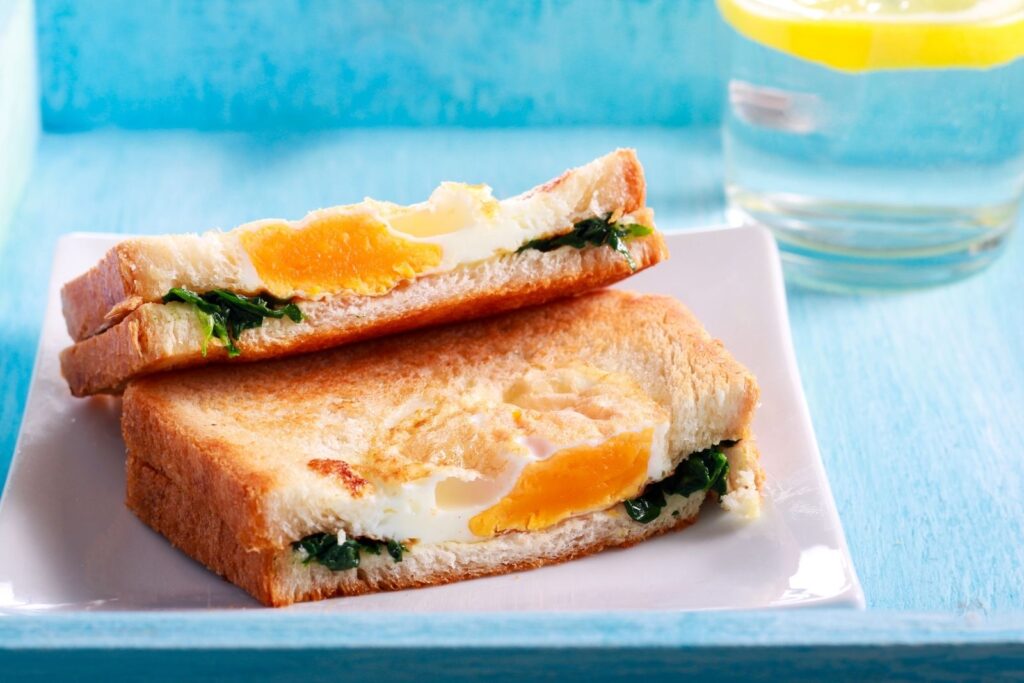 Egg and spinach sandwich grilled on bread
